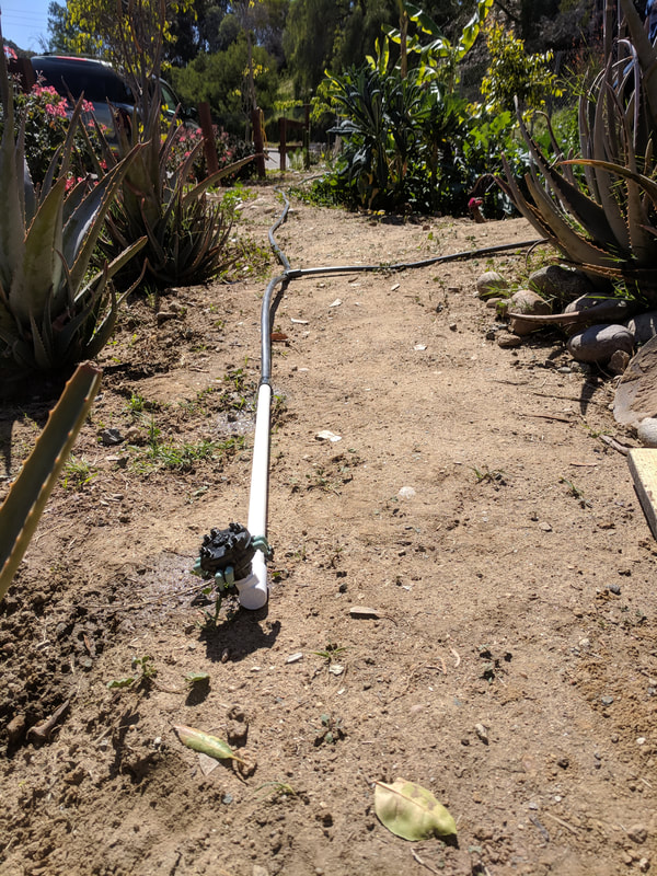 Blocked end of irrigation system that can be expanded upon